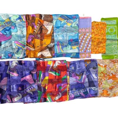 Sale Photo Thumbnail #88: Makers include Picasso, and more. Total of 13 scarves. There are no obvious stains or tears. Some have hand-rolled edges. Measurement of largest: 60” x 13”. [CS]