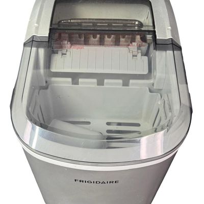 Sale Photo Thumbnail #107: This countertop piece is designed to produce up to 26 pounds of bullet-shaped ice per day. The unit automatically pauses and illuminates an indicator light when the ice basket is completely full or when it requires more water. It is working at the time of
