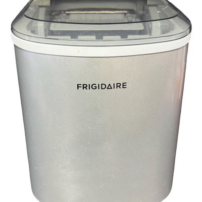 Sale Photo Thumbnail #106: This countertop piece is designed to produce up to 26 pounds of bullet-shaped ice per day. The unit automatically pauses and illuminates an indicator light when the ice basket is completely full or when it requires more water. It is working at the time of