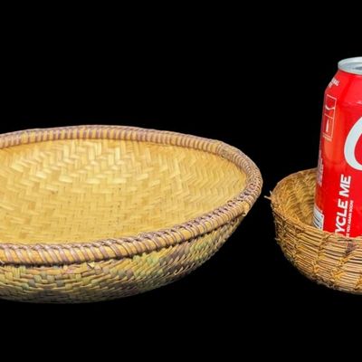 Sale Photo Thumbnail #146: Includes a polychrome Bangchung basket, and a primitive Rye straw basket. There is age related wear, but each basket is still tightly woven. Measurement of largest: 9” Diameter. [AG]