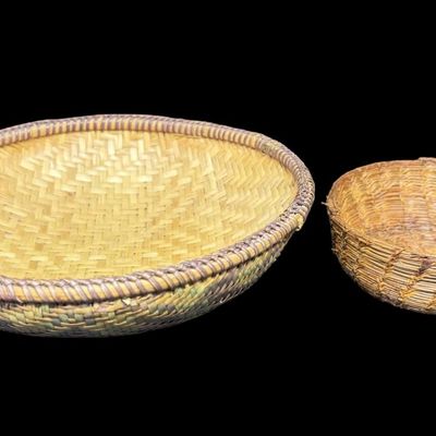Sale Photo Thumbnail #145: Includes a polychrome Bangchung basket, and a primitive Rye straw basket. There is age related wear, but each basket is still tightly woven. Measurement of largest: 9” Diameter. [AG]