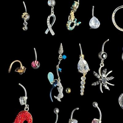 Sale Photo Thumbnail #158: This assortment includes barbells, and more. Motifs include seasonal, mermaids, stones, and more. Some pieces may be incomplete. Total of 30+ pieces. [AG]