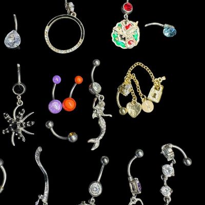 Sale Photo Thumbnail #157: This assortment includes barbells, and more. Motifs include seasonal, mermaids, stones, and more. Some pieces may be incomplete. Total of 30+ pieces. [AG]