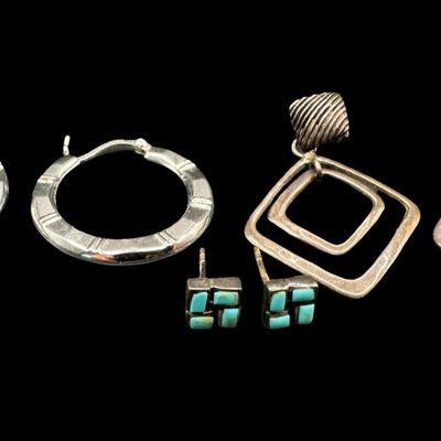 Sale Photo Thumbnail #159: This sterling silver earrings assortment includes a pair of hoop earrings, a pair of turquoise earrings, and a pair of dangle earrings. Total of three pairs of earrings. The total weight is 9.72 grams. [AG]