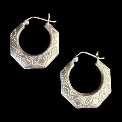 Sale Photo Thumbnail #165: This sterling silver earrings assortment includes a pair of hoop earrings, and two pairs of drop earrings. Total of three pairs of earrings. The total weight is 9.71 grams. The silver content of some pieces may have been confirmed with testing. [AG]