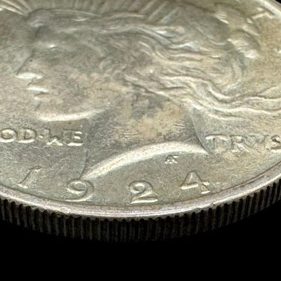 Sale Photo Thumbnail #168: This 1924 Peace dollar is not graded. The silver content is 90%. [PM]