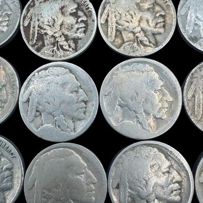 Sale Photo Thumbnail #184: Includes 19 Buffalo nickels, and three Jefferson war nickels. Total of 22 coins with assorted dates. [PM]