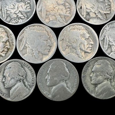 Sale Photo Thumbnail #186: Includes 19 Buffalo nickels, and three Jefferson war nickels. Total of 22 coins with assorted dates. [PM]
