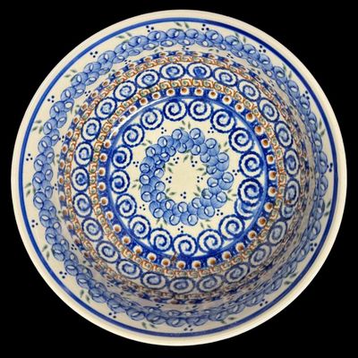 Sale Photo Thumbnail #187: The design on this piece showcases a repeating “blue rings” or abstract floral berry motif, framed by traditional geometric accents and a dark blue rim. This is an authentic Unikat piece from the highly prestigious Ceramika Artystyczna factory. Measur