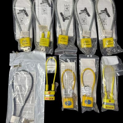 Sale Photo Thumbnail #204: Includes Ruger, Mossberg, Master, and more. Total of ten pieces. Each lock has the original keys and packaging. [GG]
