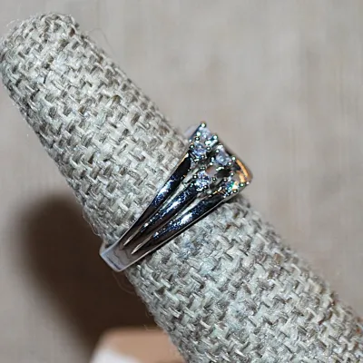 Size 6 Beautiful "Bejeweled WING" RING -Marked .925 - with 10 Clear Round Stones on a Silver "Ladder" Style Setting...