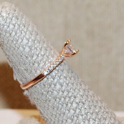 Size 7 Rose Gold 4 Prong Round Clear Main Stone Ring with 8 Accent Stone on Each Side on a Rose Gold Band (2.0g)