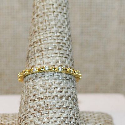 Size 8 Delicate All Infinity Styled Ring with Tiny Round Clear Stones Separated by Half Globe Accents on a Gold Tone Band (1.3g)
