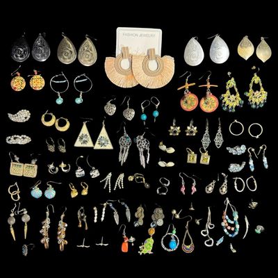 Sale Photo Thumbnail #215: Includes gold tone, silver tone, rhinestones, abalone, beads, and more. There is a variety of styles, including hoop, dangle, stud, and more. Total of 35+ pairs, and 10+ single earrings. [AG]