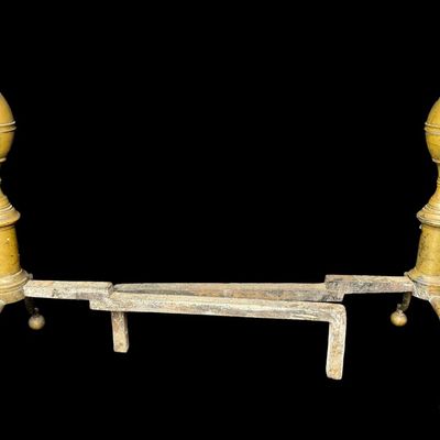 Sale Photo Thumbnail #218: These early Federal style pieces are constructed of brass and iron. They feature a classic Federal style, or Colonial style, baluster design with “double lemon” or acorn-shaped finials, and spurred cabriole legs terminating in ball feet. One pair. Mea