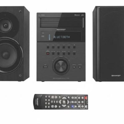Sale Photo Thumbnail #274: This system features a 5-disc CD tray with “Play Exchange.” It has Bluetooth streaming along with built-in NFC for quick, one-touch pairing. This unit has never been removed from the original container. Measurement of box: 19” x 14” x 17”. [AG]