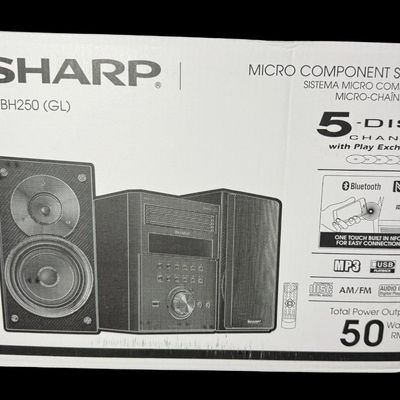 Sale Photo Thumbnail #270: This system features a 5-disc CD tray with “Play Exchange.” It has Bluetooth streaming along with built-in NFC for quick, one-touch pairing. This unit has never been removed from the original container. Measurement of box: 19” x 14” x 17”. [AG]