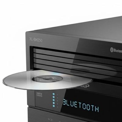 Sale Photo Thumbnail #273: This system features a 5-disc CD tray with “Play Exchange.” It has Bluetooth streaming along with built-in NFC for quick, one-touch pairing. This unit has never been removed from the original container. Measurement of box: 19” x 14” x 17”. [AG]