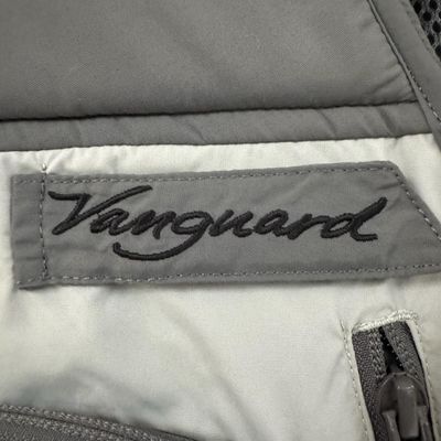Sale Photo Thumbnail #289: NOS. This vest features a weather-resistant nylon shell. It is new, with tags. The size is Large. [GG]