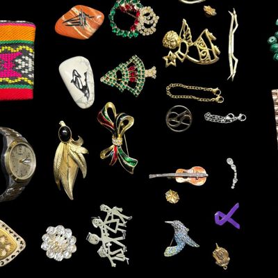 Sale Photo Thumbnail #293: Includes 24 brooches and pins, two Timex watches (not tested), etched stones, shoe clips, and more. Some pieces may be incomplete, or need repair. [AG]