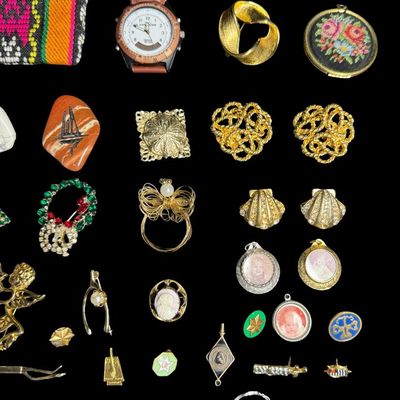 Sale Photo Thumbnail #294: Includes 24 brooches and pins, two Timex watches (not tested), etched stones, shoe clips, and more. Some pieces may be incomplete, or need repair. [AG]