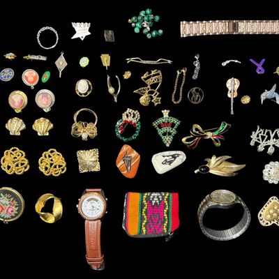 Sale Photo Thumbnail #292: Includes 24 brooches and pins, two Timex watches (not tested), etched stones, shoe clips, and more. Some pieces may be incomplete, or need repair. [AG]
