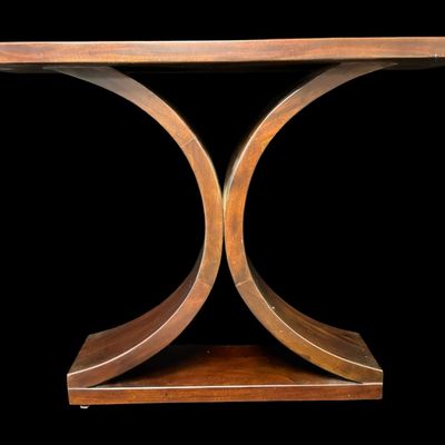 Sale Photo Thumbnail #319: This table features an abstract hourglass or intersecting dual-arch pedestal base. The fluid geometry of this piece mimics mid-century modern and Art Deco aesthetics. There is age related wear. Measurement: 40”W x 31”H. [VB]