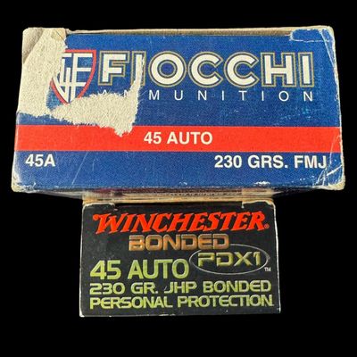 Sale Photo Thumbnail #331: Includes a previously unopened box of 20 rounds of Winchester 230 grain bonded PDX1 .45 ammunition, and a previously unopened box of 50 rounds of Fiocchi 230 grain FMJ .45 ammunition. Total of 70 rounds. **NO SHIPPING ON AMMUNITION.** [RS]