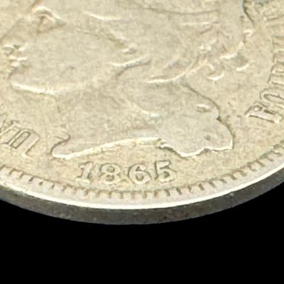 Sale Photo Thumbnail #373: This is an 1865 copper-nickel three cent piece. It is not graded. [PM]