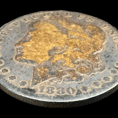 Sale Photo Thumbnail #377: This 1880-O Morgan is not graded. The silver content is 90%. [PM]