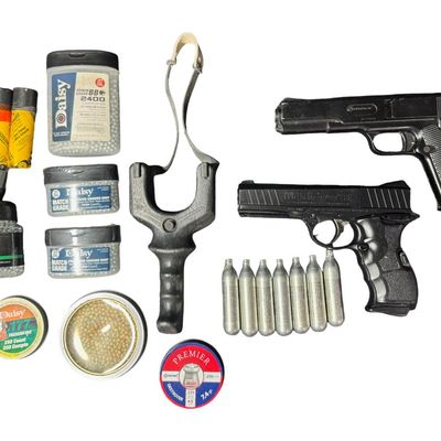 Sale Photo Thumbnail #394: Includes a Marksman slingshot, a Daisy Powerline 408 .177 caliber pistol, BBs, pellets, and more. **AMMO AND CO2 CARTRIDGES WILL NOT BE SHIPPED.** [LG]