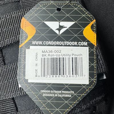 Sale Photo Thumbnail #403: Includes a pair of unopened women’s LAPG tactical pants (size 20 long), a Condor roll-up utility pouch, an NcStar folding dump pouch, and an LAPG multi-purpose pouch. Total of four pieces. [GG]