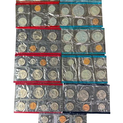 Sale Photo Thumbnail #412: Includes one 1977, one 1979, and three 1981 from the Philadelphia Mint; and three 1977, one 1979, and two 1981 from the Denver Mint. The outer envelopes are missing. [PM]
