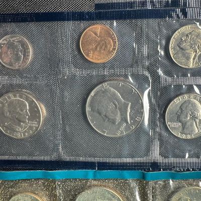 Sale Photo Thumbnail #413: Includes one 1977, one 1979, and three 1981 from the Philadelphia Mint; and three 1977, one 1979, and two 1981 from the Denver Mint. The outer envelopes are missing. [PM]