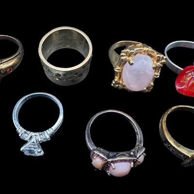 Sale Photo Thumbnail #426: Includes green tourmaline, CZ, pink quartz, coral, and other modern rings. Some pieces have a 14K gold vermeil wash. Total of seven rings. The total weight is 44.83 grams. [GG]