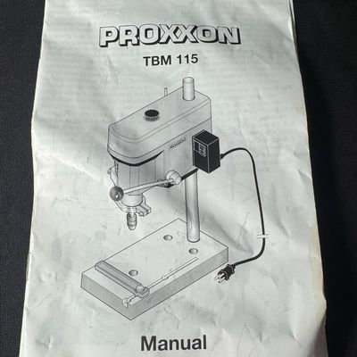 Sale Photo Thumbnail #450: This is a highly precise tabletop power tool engineered specifically for micro-hole drilling in model making, jewelry, electronics, and other fine projects. It operates between 1800 and 8500 rpm. Working at the time of catalog. [RS]