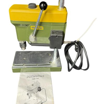 Sale Photo Thumbnail #449: This is a highly precise tabletop power tool engineered specifically for micro-hole drilling in model making, jewelry, electronics, and other fine projects. It operates between 1800 and 8500 rpm. Working at the time of catalog. [RS]