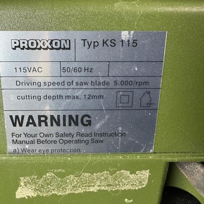 Sale Photo Thumbnail #456: This is made of a surface-milled, die-cast aluminum measuring 160mm x 160mm. It is a compact miniature table saw engineered for precise straight cuts in delicate materials like wood, plastics, and non-ferrous metals. It is primarily used for model buildin