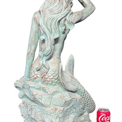 Sale Photo Thumbnail #458: This mermaid statue is made of resin, and has a bronze style patina. It measures 29” high. There are no obvious chips or cracks. [AG]
