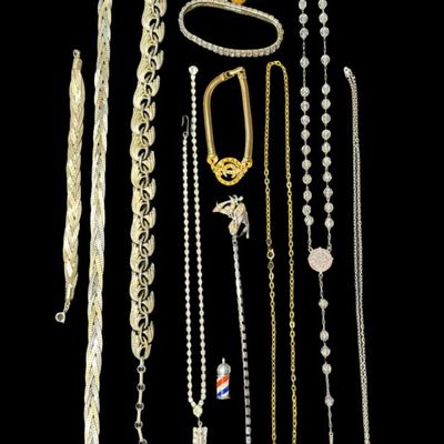 Sale Photo Thumbnail #480: Includes gold tone, silver tone, necklaces, bracelets, earrings, and more. Total of 20 pieces. [PM]