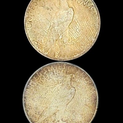 Sale Photo Thumbnail #504: Includes a 1923 Peace dollar, and a 1923-S Peace dollar. Total of two ungraded coins. The silver content is 90%. [PM]