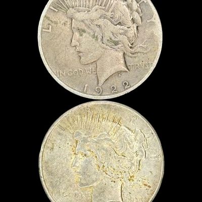 Sale Photo Thumbnail #507: Includes a 1922-S Peace dollar, and a 1926 Peace dollar. Total of two ungraded coins. The silver content is 90%. [PM]