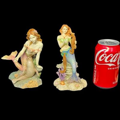 Sale Photo Thumbnail #520: Includes Ashtyn, Taylor, Nycole, and Courtney. Total of four colorful mermaids, with resin construction. Measurement of tallest: 6.5”H. [AG]