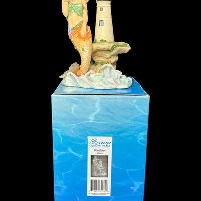 Sale Photo Thumbnail #527: Includes Courtney, Kyra, Mya, and more. Total of four colorful mermaids, with resin construction. Measurement of tallest: 10.25”H. [AG]