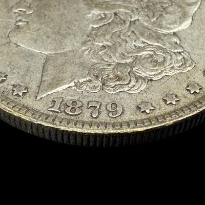 Sale Photo Thumbnail #546: This 1879 Morgan is not graded. The silver content is 90%. [PM]
