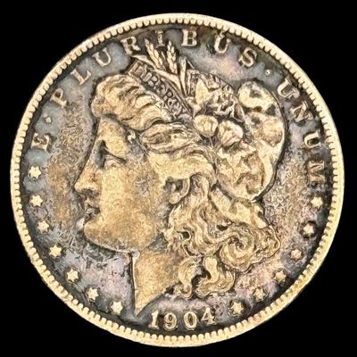 Sale Photo Thumbnail #547: This 1904 Morgan is not graded. The silver content is 90%. [PM]