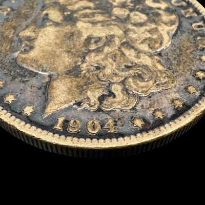 Sale Photo Thumbnail #549: This 1904 Morgan is not graded. The silver content is 90%. [PM]