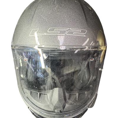 Sale Photo Thumbnail #555: Includes a pair of LS2 helmets, and an Arai helmet with built-in communication/microphone. The LS2 helmets include dust covers. The LS2 helmets are sizes Small and XXXL. The Arai helmet is a size Large. Not tested. [AG]
