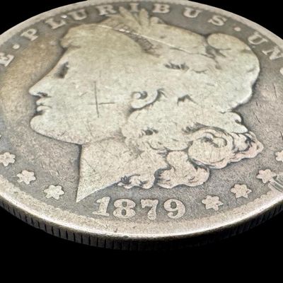 Sale Photo Thumbnail #598: This 1879 Morgan is not graded. The silver content is 90%. [PM]