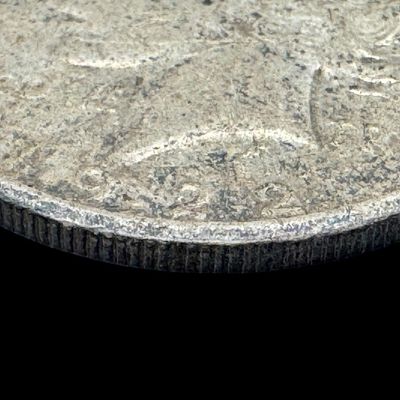 Sale Photo Thumbnail #602: This 1922-S Peace dollar is not graded. The silver content is 90%. [PM]